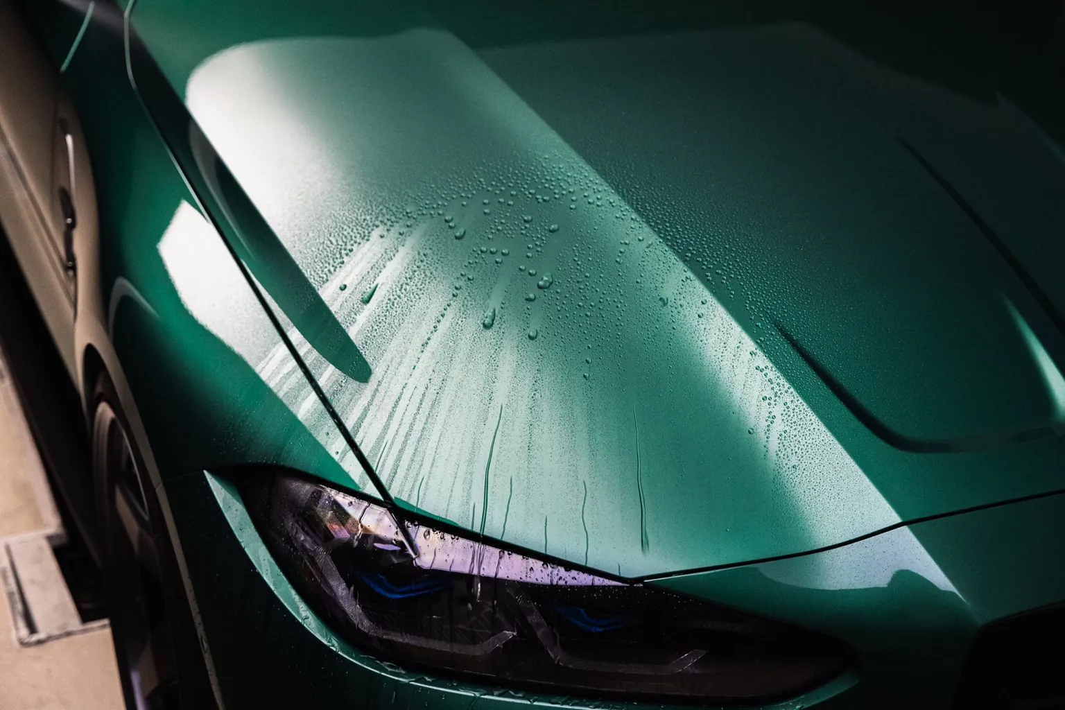Water beading on a ceramic-coated green vehicle